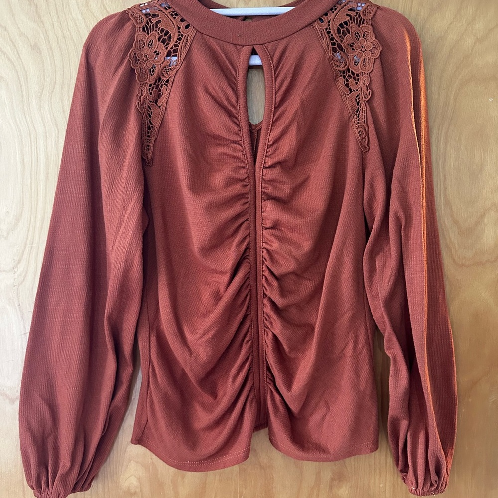 Daytrip Rust Ruched Front Long Sleeve Top with Lace Shoulders